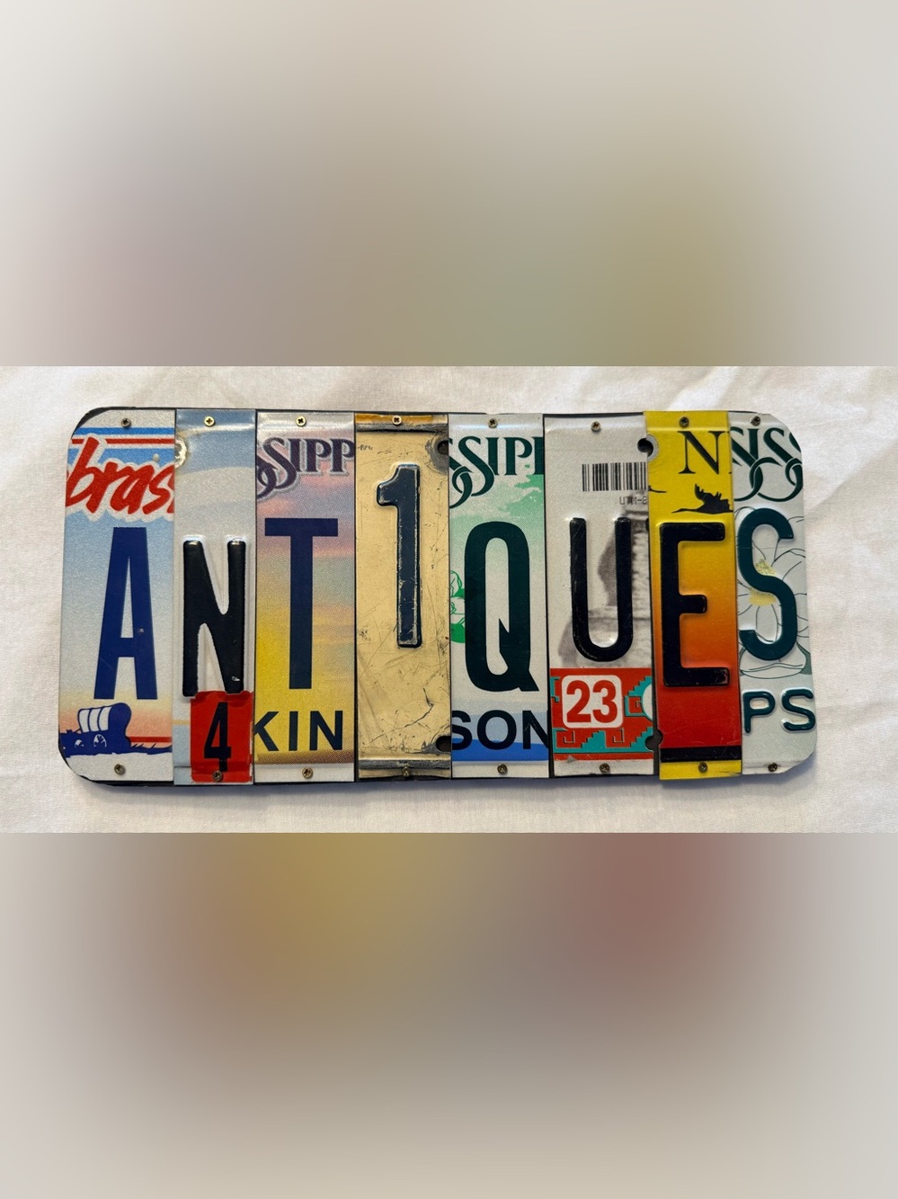 Decorative License Plate Number Collage reading Antiques